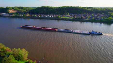 aerial - pusher boat and barge, ohio river, ironton, ohio, spinning shot