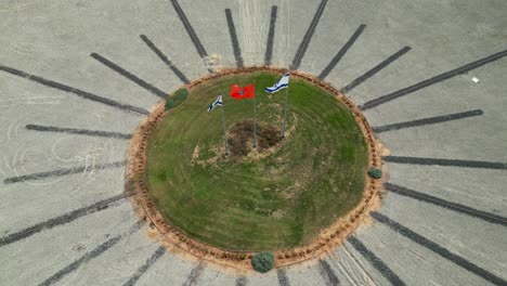 4K-high-resolution-aerial-drone-video-view-of-the-flower-highway-interchange-with-Israeli-flags--Rishon-Lezion--Israel