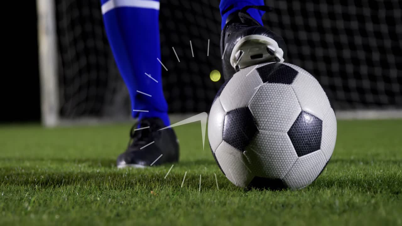 Animaatio kellosta miesjalkapalloilijan jalkojen päällä pallon kanssa
