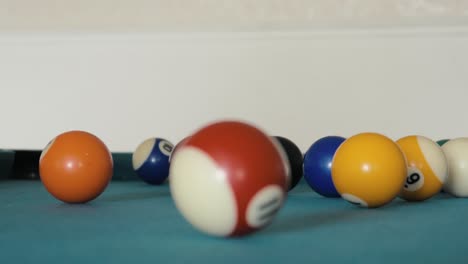 balls breaking on a pool table