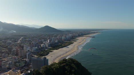 aerial view of paragliding over caiobá, brazil – coastal adventure scene