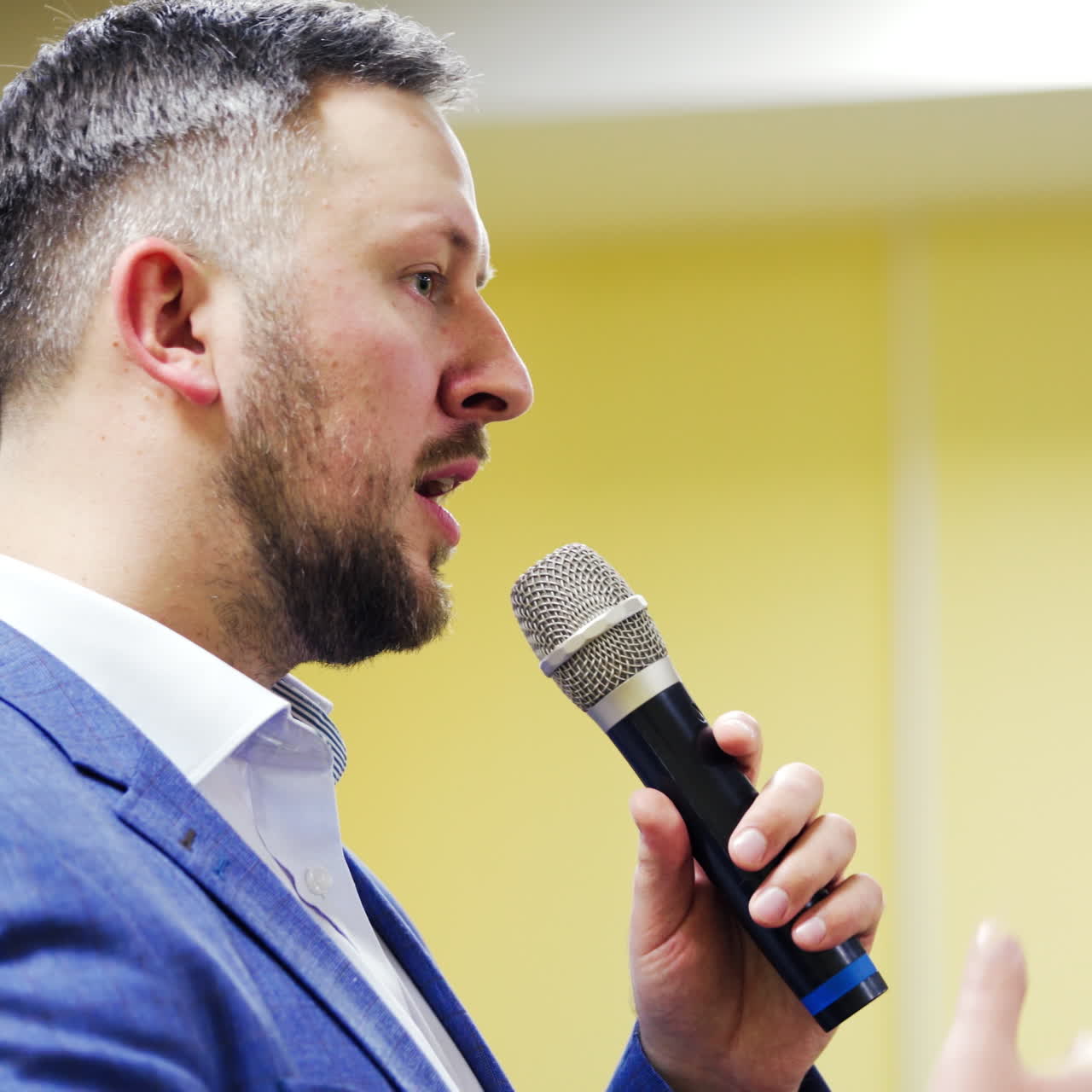 young businessman at business conference room with public giving presentations. Audience at the conference hall. Entrepreneurship club