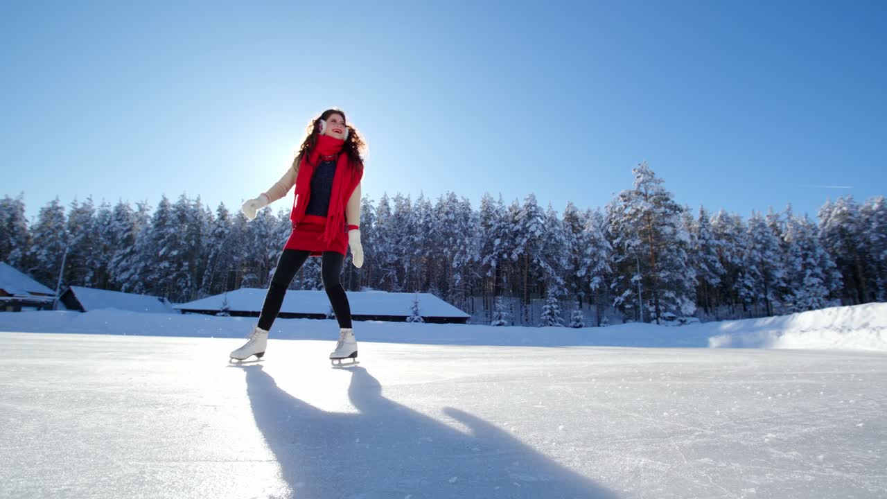 Woman Ice Skating in Winter Landscape