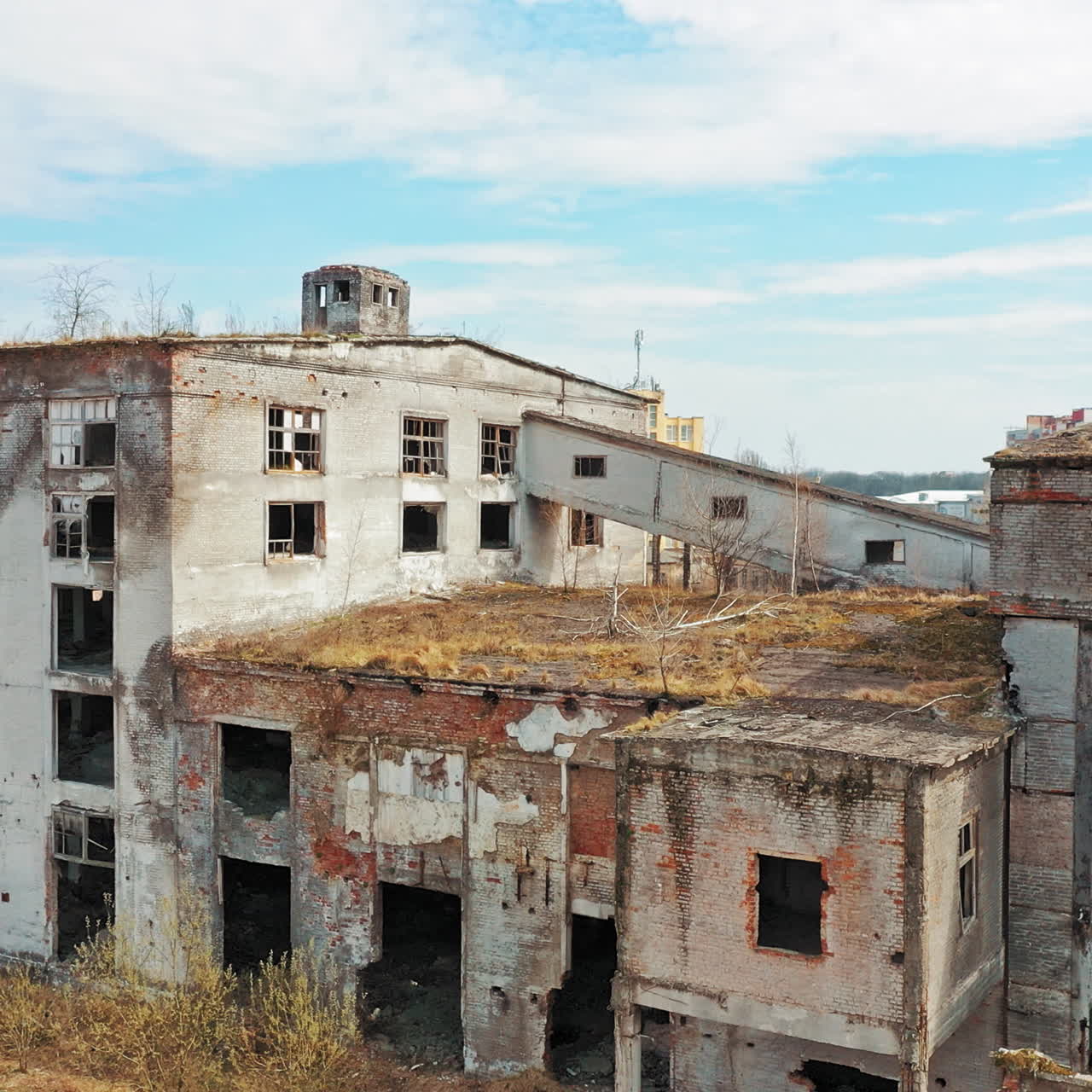 Abandoned industrial building. Ruins of an old factory. Aerial view
