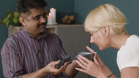 people using mortar and pestle