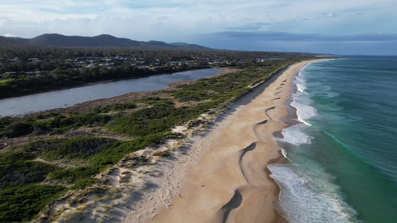 Steels Beach With Splashing Waves And Henderson Lagoon, Tasmania, Australia - Drone Shot