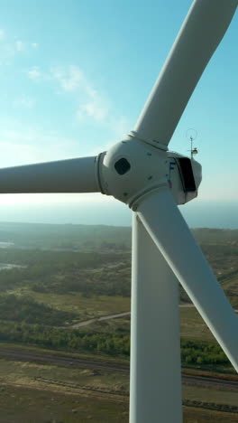 close-up view of a wind turbine blade and nacelle