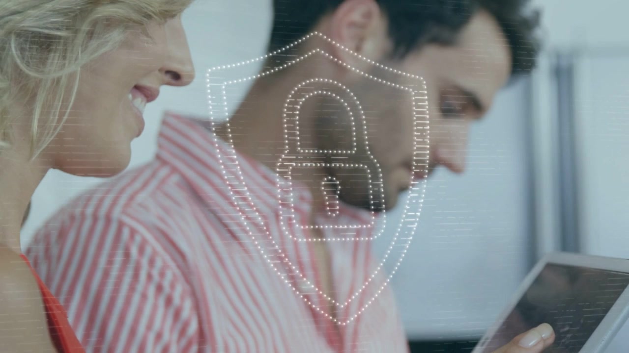 Woman tapping tablet coworker dotted shield lock appearing over tablet ensuring digital security
