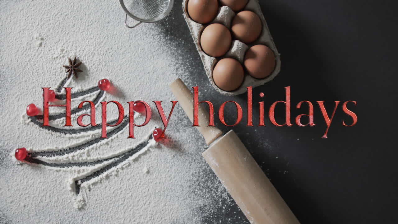 밀가루, 달 및 롤링 핀으로 그려진 크리스마스 트리 위에 빨간색으로 축하하는 휴일 텍스트