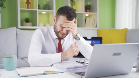 Unhappy-and-troubled-man-crying-at-home,-feeling-depressed.