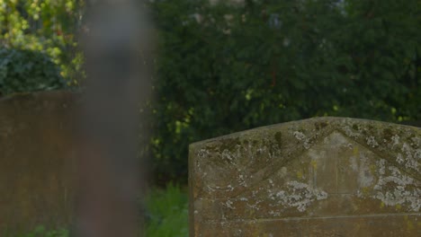 Tracking-Shot-of-Grave-Headstones-In-Oxford-Graveyard-