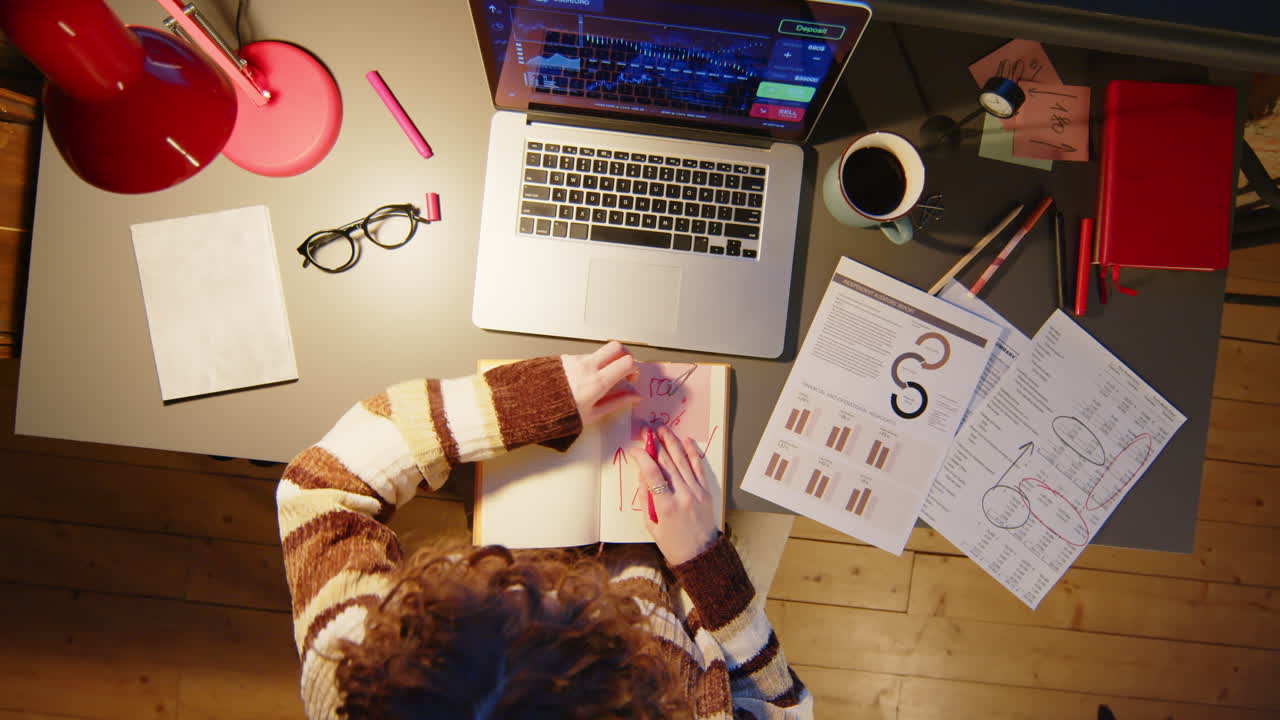Businesswoman Working with Financial Data during Night