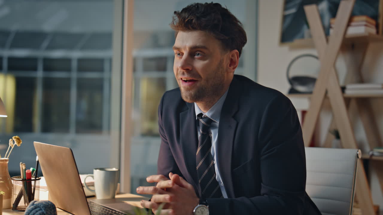Man director reading documents at office thinking on project at evening closeup