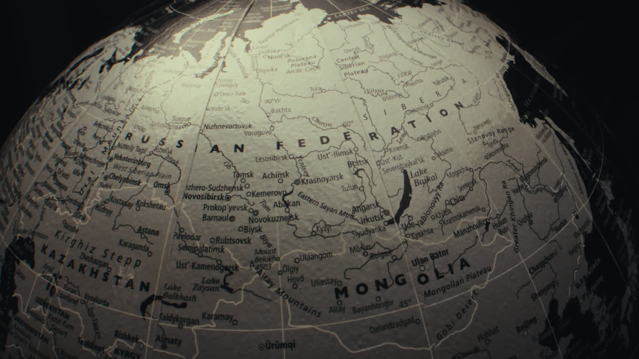 Close-up view of a world globe focused on Asia