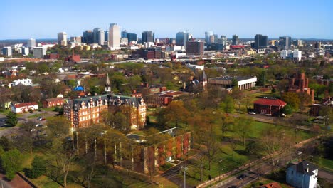 Aerial-tracking-shot-of-Fisk-University-featuring-Jubilee-Hall-and-the-city-skyline-in-Nashville-Tennessee