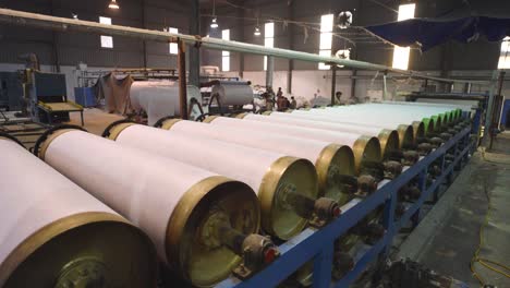 Drums-roller-and-producing-textile-and-fabric-cloth-in-a-manufacturing-warehouse-in-Pakistan