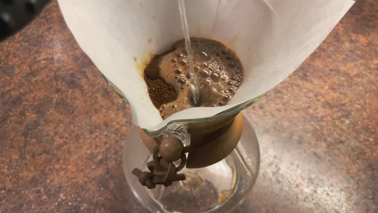 Blooming coffee in a Chemex coffee maker