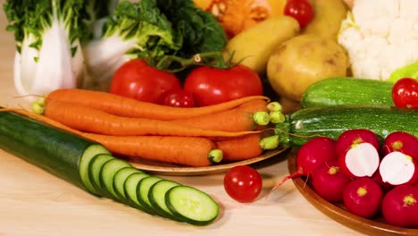 assortment of vegetables arranged on a black background