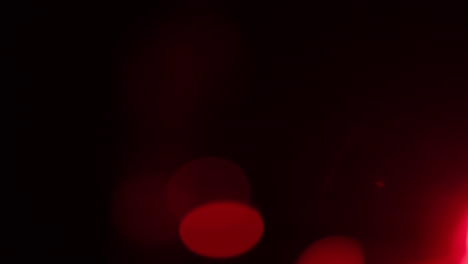abstract analogue footage featuring warm bokeh orbs glowing softly against a dark background, perfect for vfx compositing, super retro content or backgrounds and screensavers.