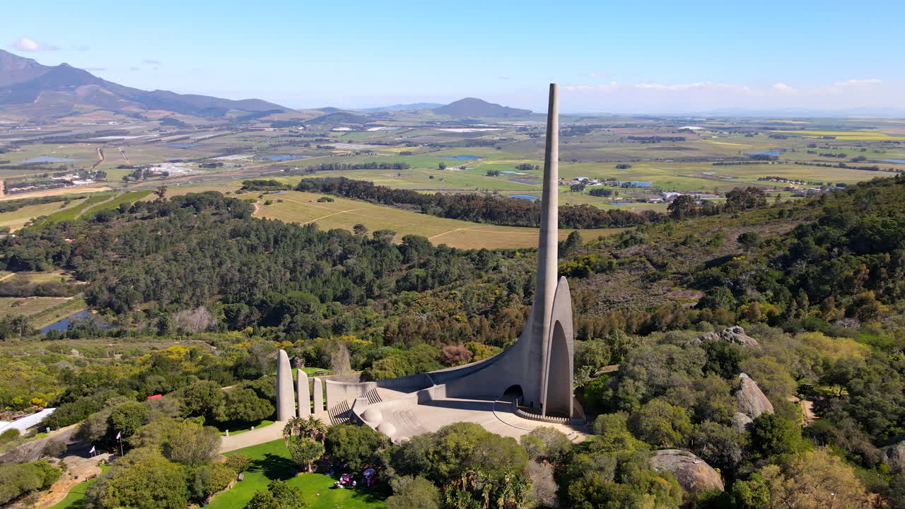 Aerial arc view of historic Afrikaans Taalmonument atop Paarl Mountain