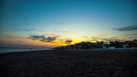 Sunset-on-empty-Beach-with-a-Beautiful-Red-Sky-on-a-Summer-Day,-Time-Lapse