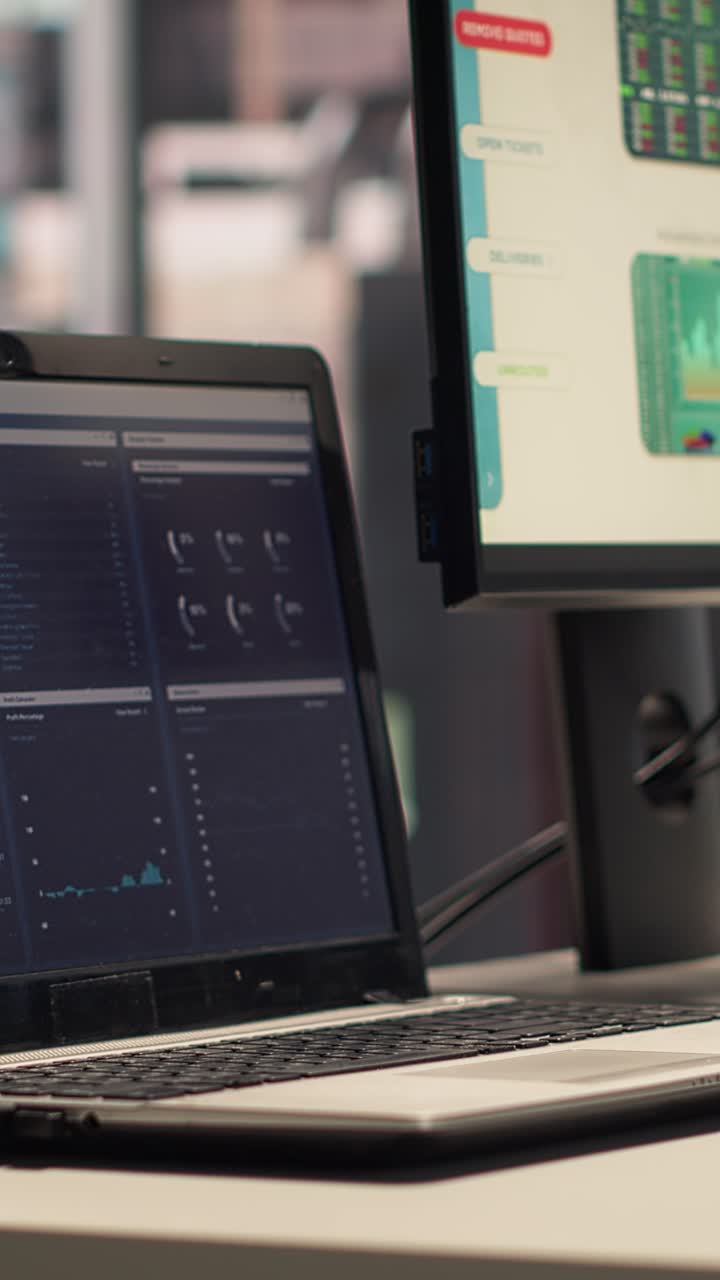 Close-up of Computer Screens Displaying Financial Data and Statistics