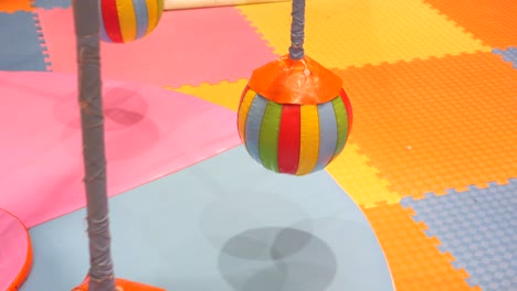 colorful hanging balls in a kids play area