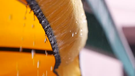 water dripping from car wash brush