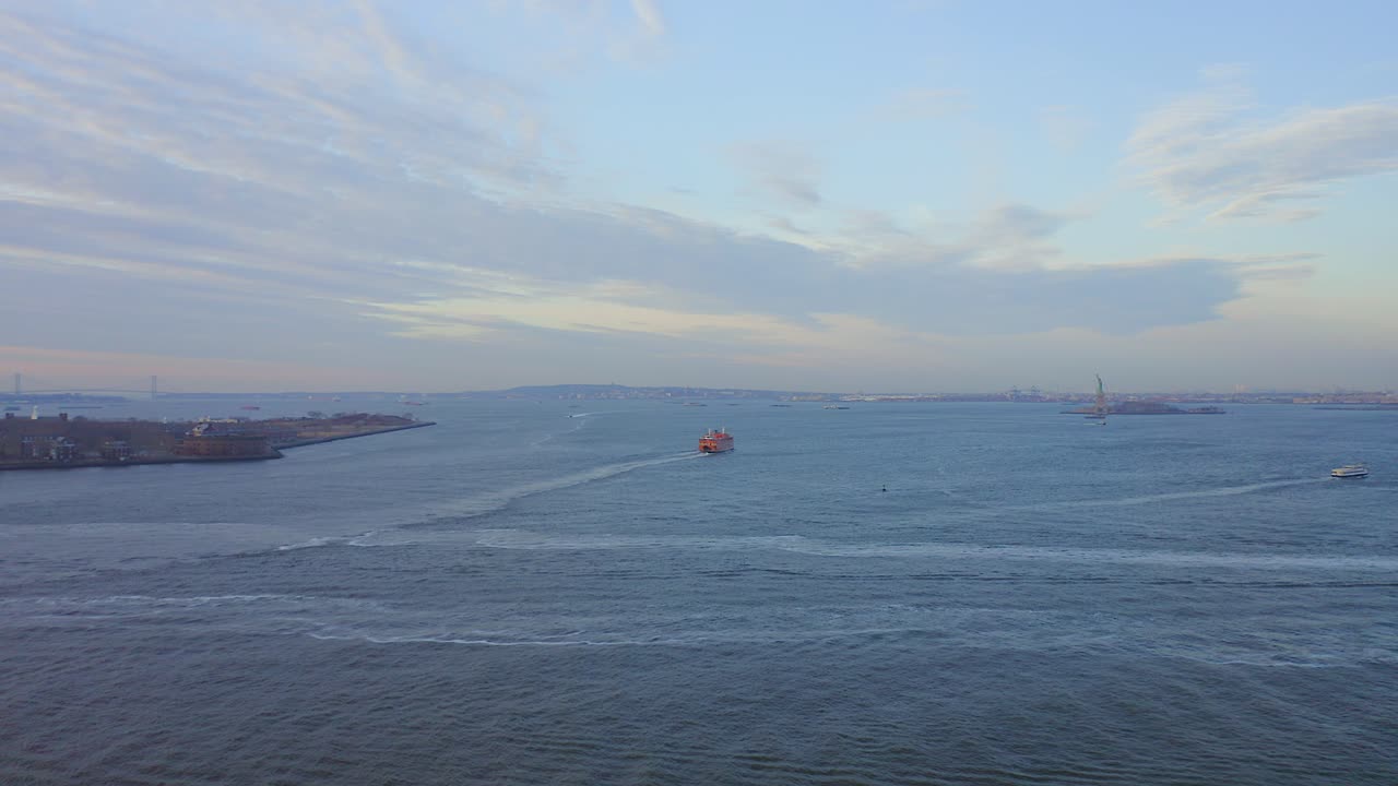 Aerial View of New York City Skyline with Statue of Liberty and Ferry