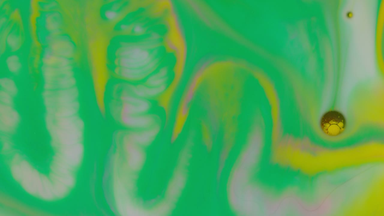 burbujas de color neón brillante aceite y tinta, pintura acrílica en movimiento de primer plano, fondo de papel tapiz
