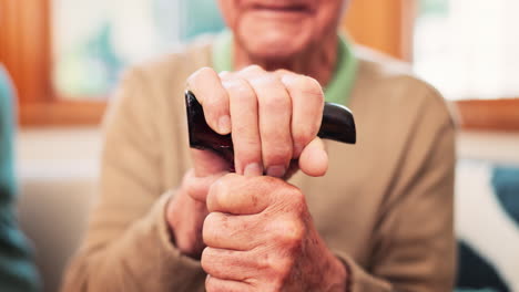 Walking-stick,-hands-and-person-with-disability