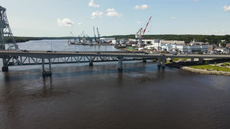 Drone-ascending-shot-revealing-Bath-Iron-Works-in-Maine