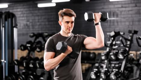 man working out with dumbbells at the gym
