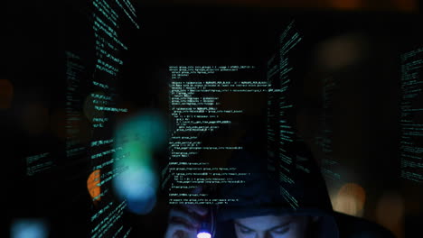 data processing and glowing spots of light against male hacker using torch