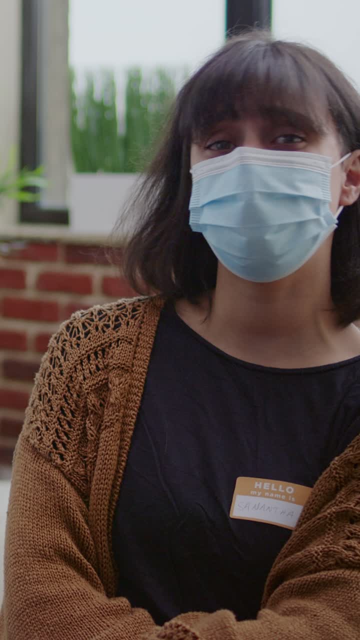 Woman wearing face mask indoors
