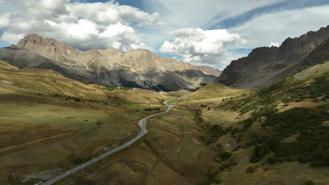 Valley-in-the-french-alps-view-from-above-sunny-day-forest-and-mountain