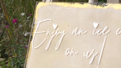 Ice-Cream-Cart-Sign,-Slow-Motion-on-a-Sunny-Day