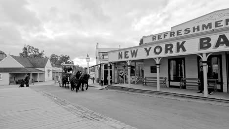 horse-drawn carriage passing by new york bakery