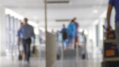 a slow motion of a blurred airport scene