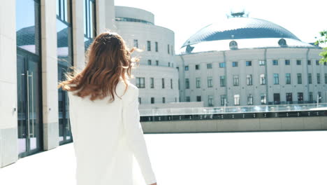 stylish woman in white suit