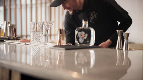 bartender preparing cocktails at a bar