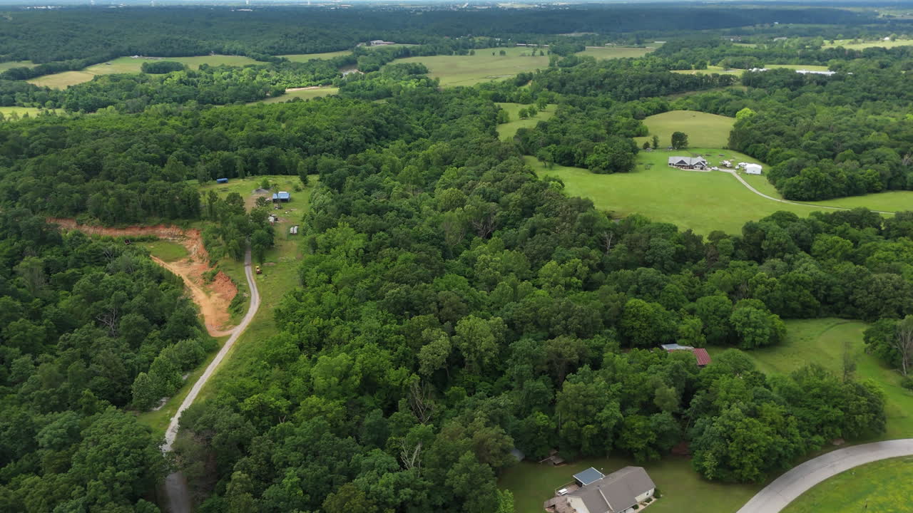 Architectures At Rural Landscape With Dense Forests In Siloam Springs, Arkansas, United States. Aerial Drone Shot