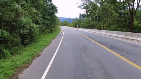 riding on a scooter on thai mountains