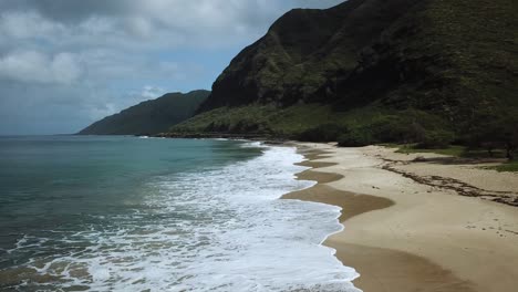 no people on an beautiful empty beach in hawaii, aerial drone