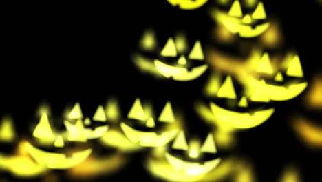 animation of scary halloween falling yellow pumpkins over black background