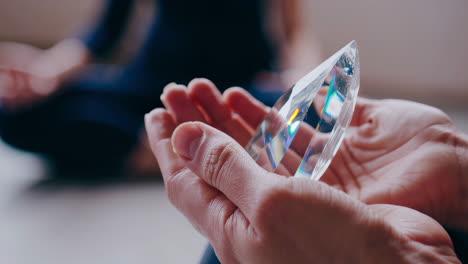 Crystal Prism in Hands During Meditation