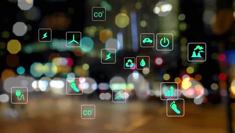 animación de múltiples iconos digitales contra la vista borrosa del tráfico nocturno de la ciudad