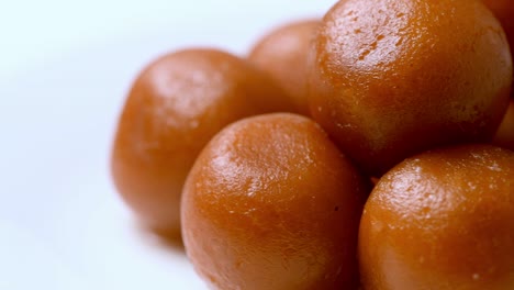 gulab jamun revolving ( indian sweet ) | dessert