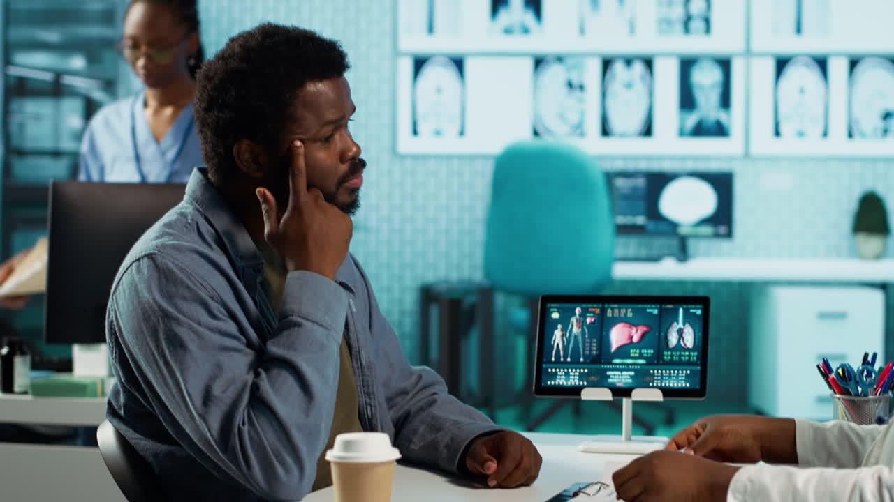 Female specialist discussing health care concerns with a male patient