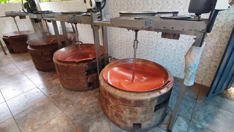 Organic-guava-sweet-preparation-in-a-indigenous-village-in-Banos-Ecuador-with-organic-farmed-healthy-fruits-being-mixed-in-a-big-batch